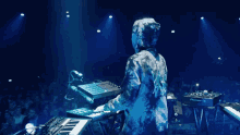 playing keyboard alan walker dj on stage live performance