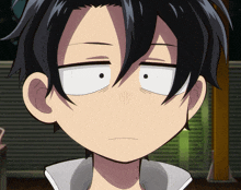 a close up of a cartoon character 's face with black hair