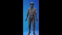 a man in a cowboy hat is dancing on a blue background