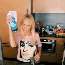 Spraying Kristin Chenoweth GIF - Spraying Kristin Chenoweth Disinfecting GIFs