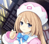 a girl with long blonde hair wearing a pink and white hat with a white o on it