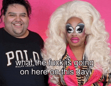 a drag queen wearing a polo shirt is standing next to a man