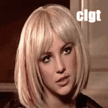 a close up of a woman 's face with the word cigt on the bottom right corner .