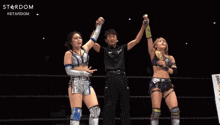 two female wrestlers in a ring with the word stardom on the bottom