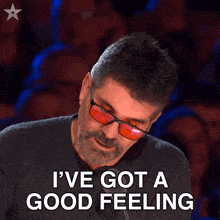 a man wearing sunglasses says i 've got a good feeling in front of a crowd