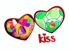 two heart shaped mirrors with the word kiss in red