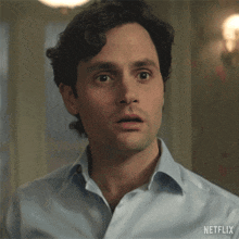 a close up of a man 's face with the word netflix on the bottom right