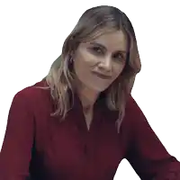 a woman in a red shirt is smiling with the words back to the behind her