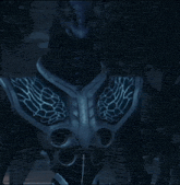 a video game character with a blue glowing armor