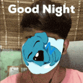 a man with a mask on his face and the words good night above him
