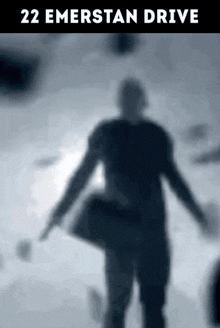 a movie poster for 22 emerstan drive shows a silhouette of a man