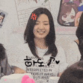 a girl wearing a white t-shirt that says ' lming ' on it
