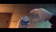 a person is holding a can of diet pepsi