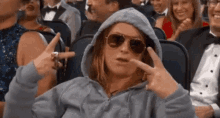 Amy Poehler Peace Sign GIF - Amy Poehler Peace Sign Chewing GIFs