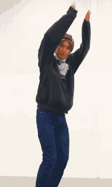 a man wearing a hard rock cafe sweatshirt