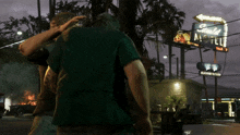 a couple of men standing in front of a motel