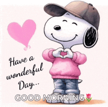 a picture of snoopy making a heart with his hands and the words have a wonderful day good morning