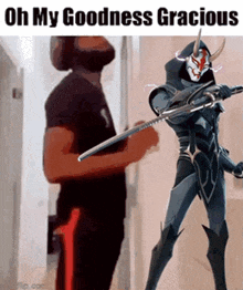 a man in a black shirt is standing next to a cartoon character with horns and a sword .