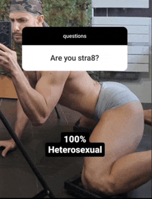 a man taking a selfie with the question " are you stra8 " on the top