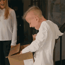 Opening The Package Alex Boye GIF - Opening The Package Alex Boye Presents GIFs