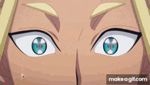 a boy with blue hair and yellow hair is holding a spinning top in his hand .