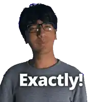 a man wearing glasses and a shirt that says exactly on it