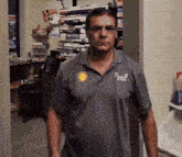 a man wearing a grey shirt that says ' florida ' on it