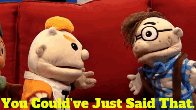 two stuffed animals are standing next to each other with the words