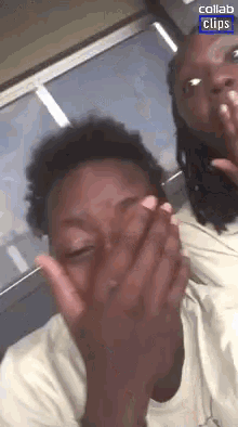 two people covering their faces with their hands and the words collab clips on the bottom right