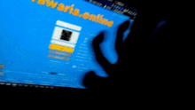 a blurry image of a person playing a game on a computer