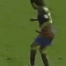 a soccer player wearing a jersey with the number 19 on it