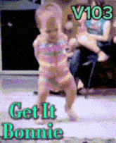 a baby is dancing with the words get it bonnie