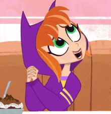 a cartoon girl wearing a purple hoodie is sitting at a table with a bowl of chocolate ice cream .