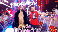 wwe kevin owens hes got signs signs sign