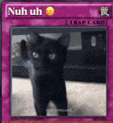 a purple card with a picture of a black cat and the words nuh uh