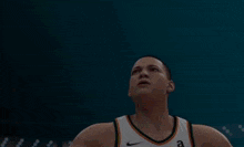 a man in a sonics jersey looks up into the sky