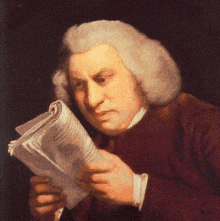 a man in a wig is reading a book