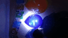 a blue balloon with the number 1 on it is lit up