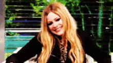 Avril Lavigne Shy GIF - Avril Lavigne Shy Shrug GIFs