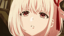 a close up of a girl 's face with red eyes and white hair