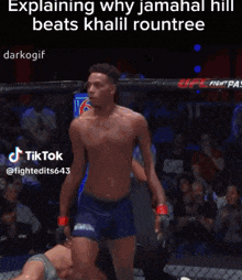 a man is standing in a boxing ring without a shirt on .