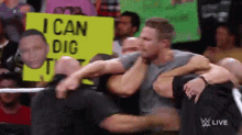 stephen-amell-hold-me-back-wwe.gif