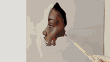 a person is painting a woman 's face with a brush that says made in animotica