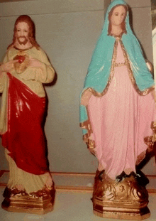 a statue of jesus and a statue of virgin mary