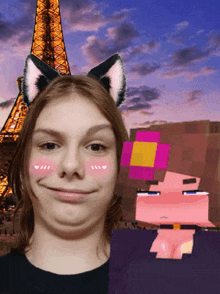a boy wearing cat ears and a girl wearing a purple shirt are posing in front of the eiffel tower