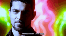 a man with a beard says abandonment loneliness in a blurry photo