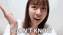 a woman says " i don 't know " while making a face