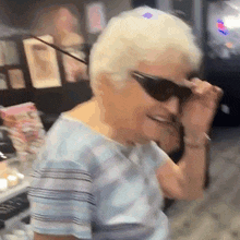 Taking Off Sunglasses Happily GIF - Taking Off Sunglasses Happily Taking Off Shades GIFs