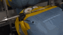 a person is sleeping in a sleeping bag on a plane .