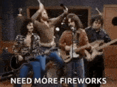 a group of men are playing guitars and singing into microphones while standing in a room .